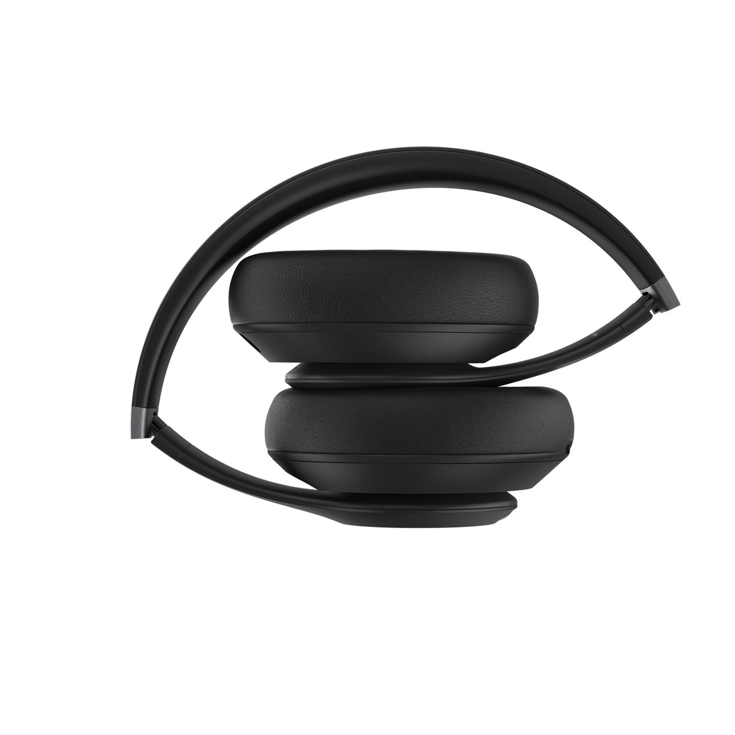 Auriculares negros plegados, con dos auriculares apilados, fondo blanco.