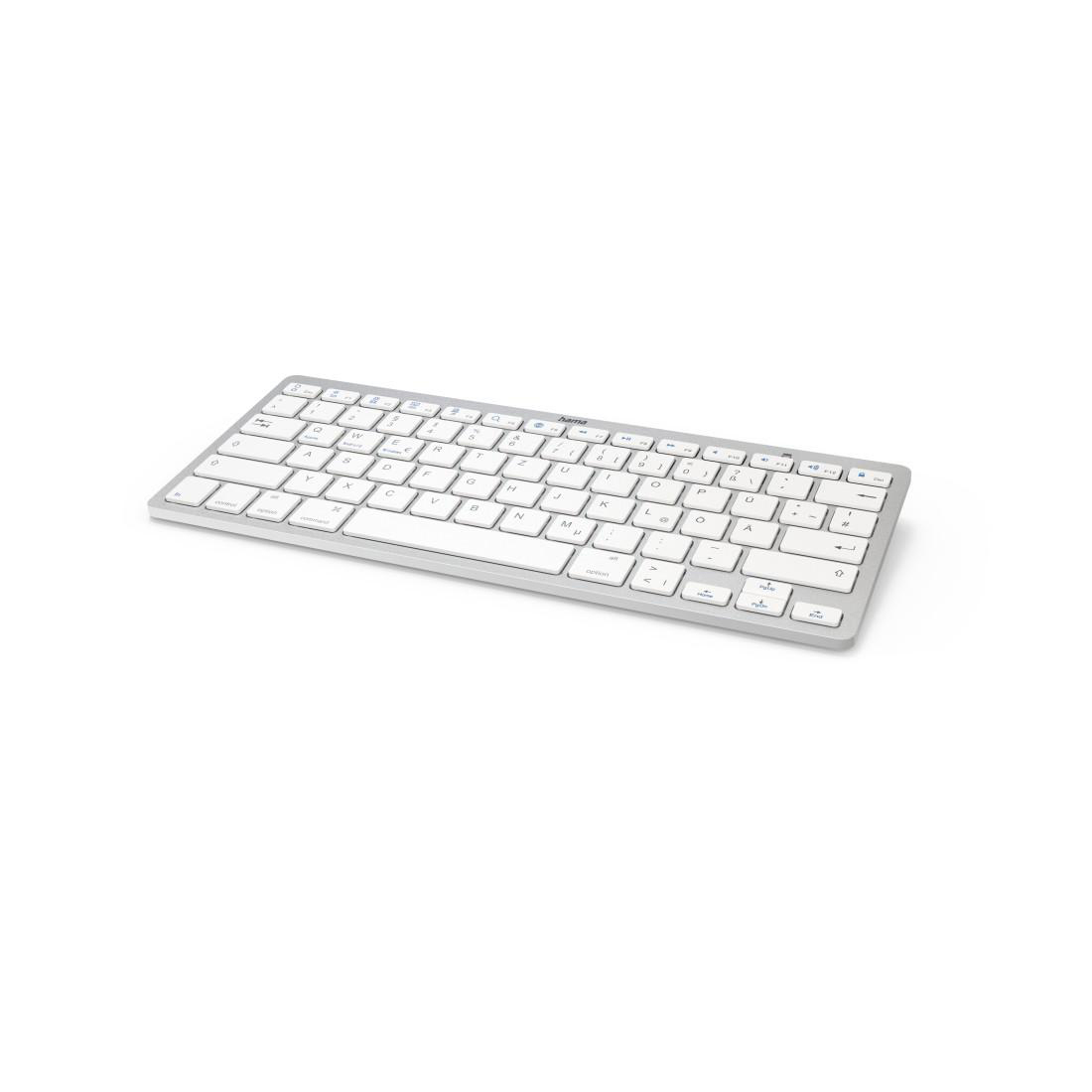 Weiße Tastatur mit grauen Tasten, flaches Design. Die Tastatur befindet sich auf einer weißen Oberfläche.