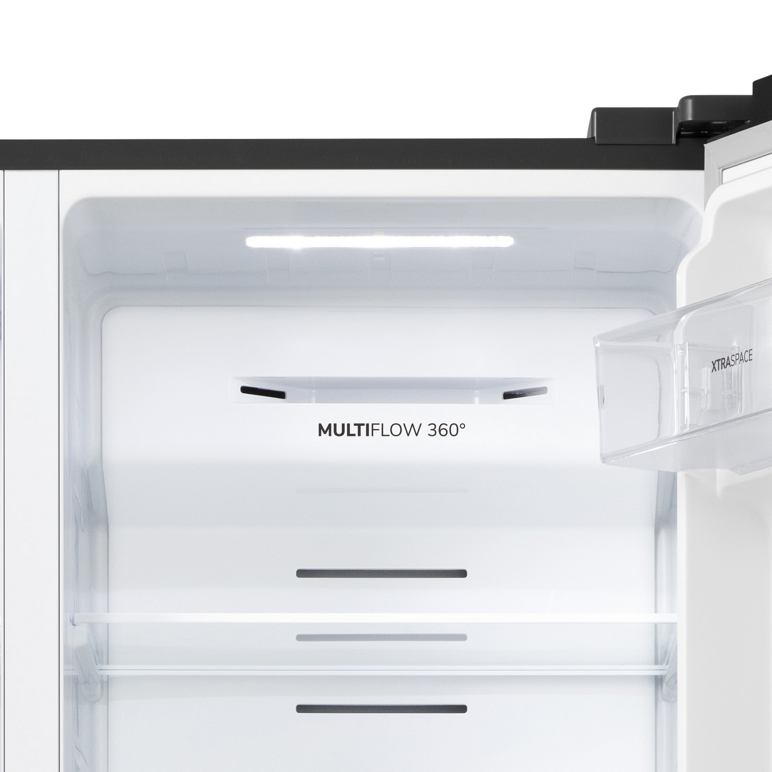 Refrigerator interior with shelves and a bright LED light. MultiFlow 360° text is visible.