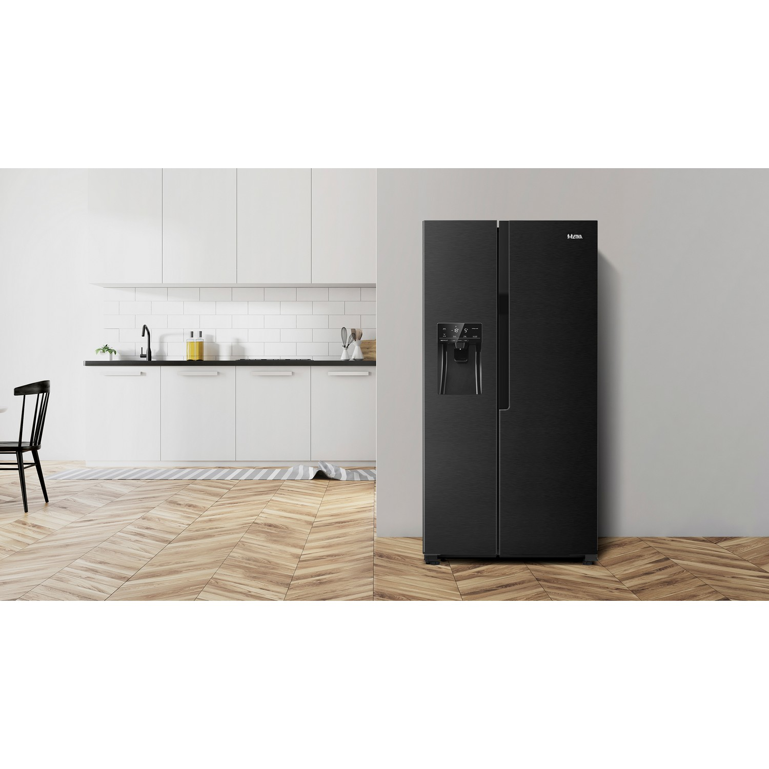 Black refrigerator in a kitchen with white cabinets and wooden floor.