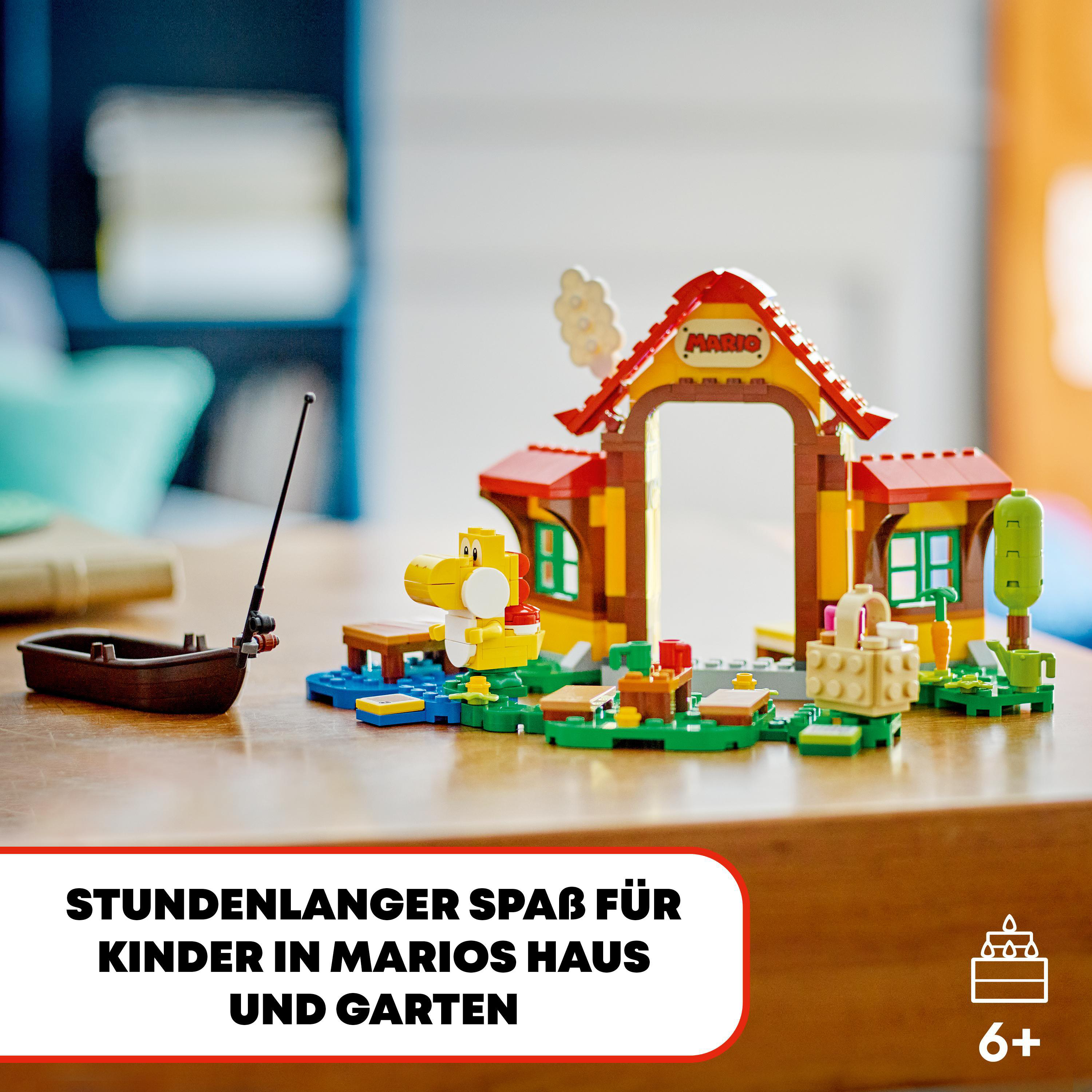 Lego-Set, Marios Haus und Garten. Gelber Yoshi und ein Fischerboot.