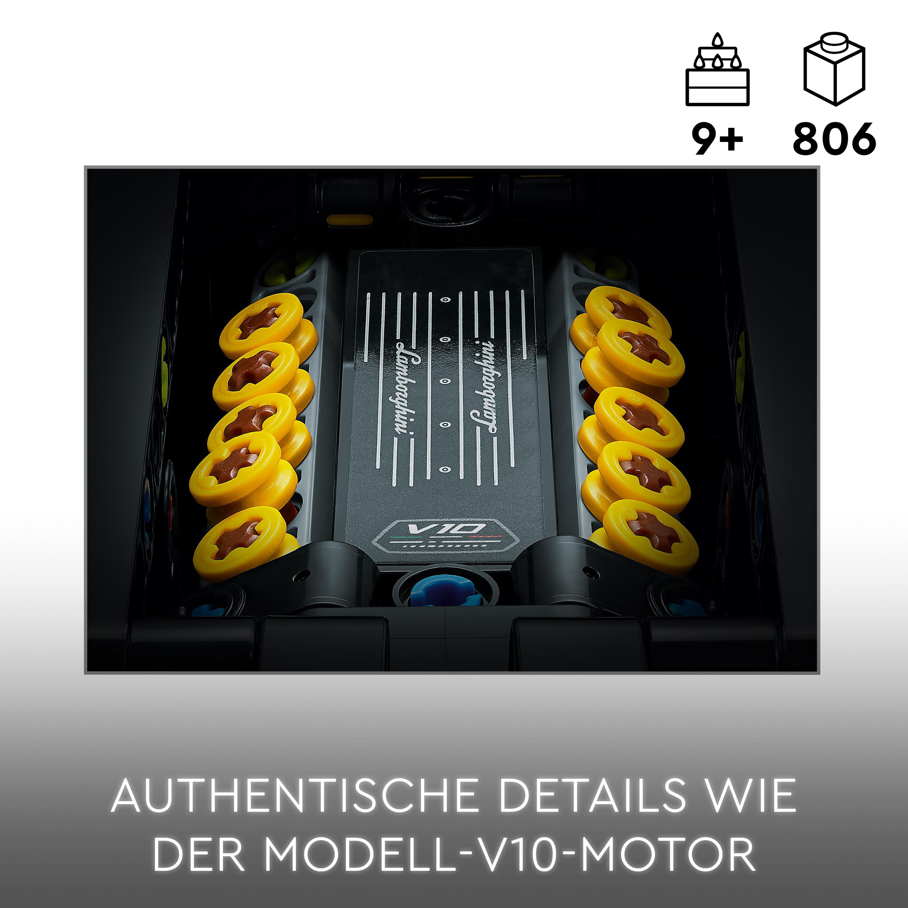 Nahaufnahme eines V10-Motors. Gelbe Zylinder sind auf beiden Seiten sichtbar, mit dem Lamborghini-Logo.