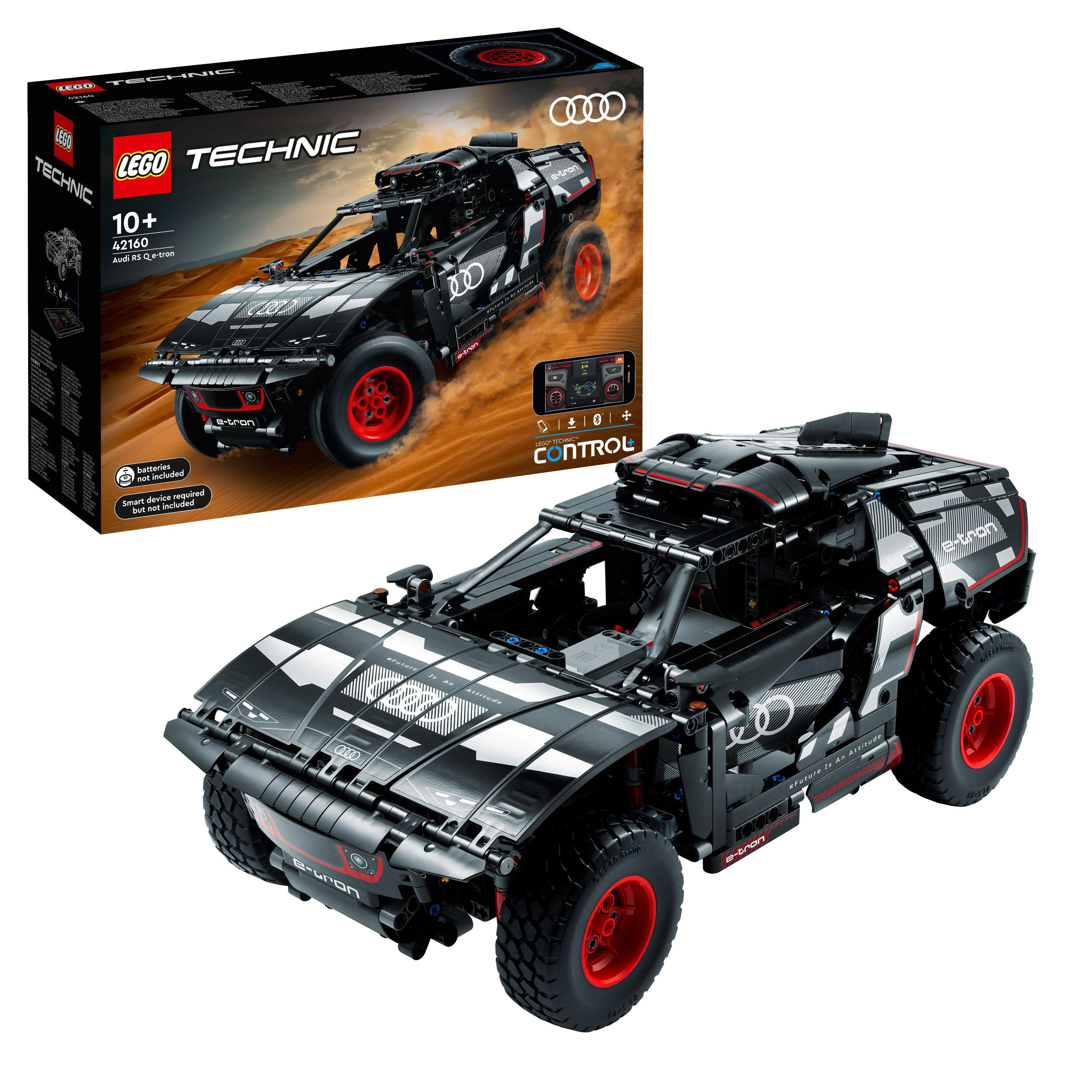 Lego Technic Audi RS Q e-tron Modellauto-Bausatz. Schwarz-weißes Auto mit roten Rädern, auf weißem Grund.