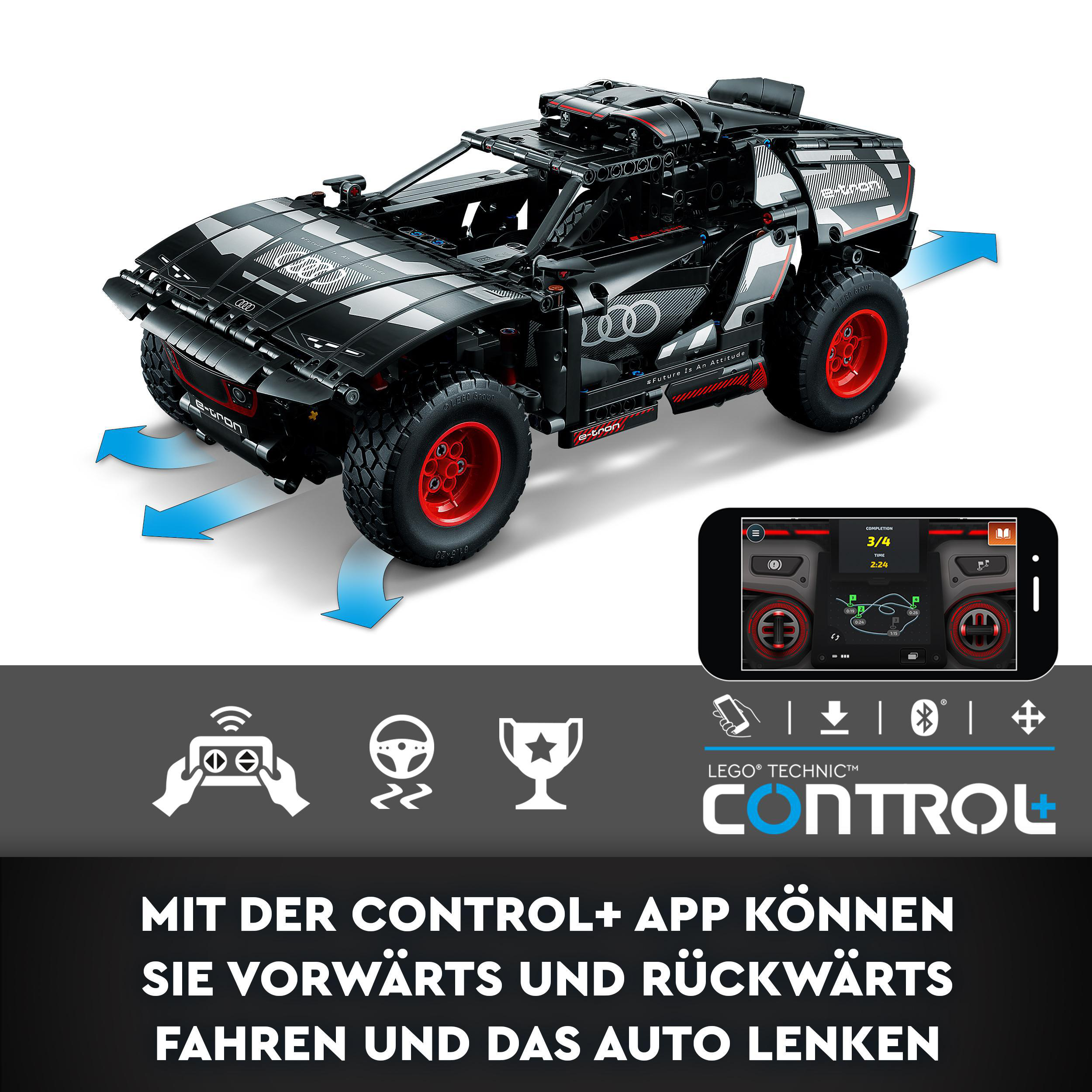 Ein schwarzes ferngesteuertes Auto mit roten Akzenten und ein Telefon mit Bedienelementen. Das Auto ist in Bewegung.