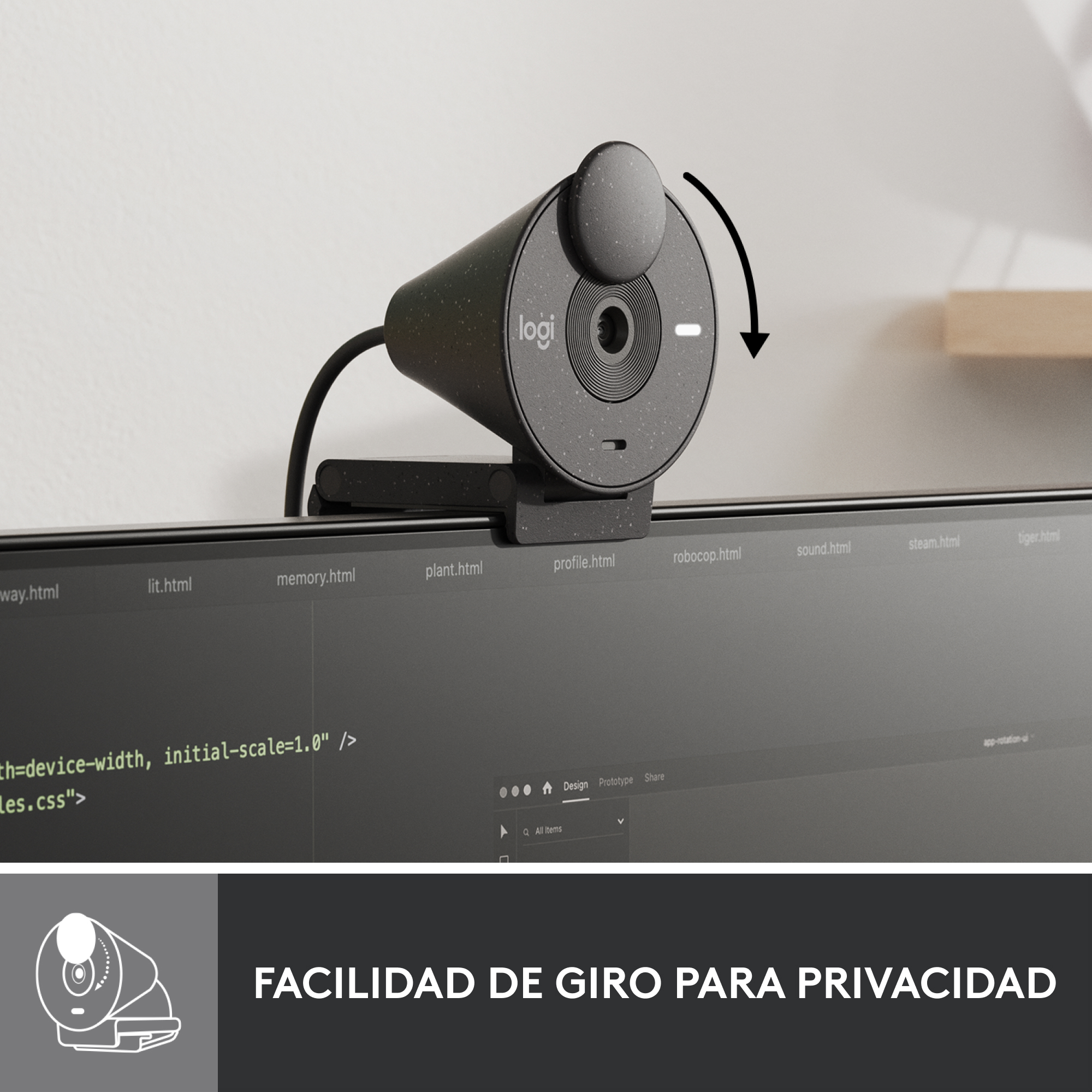 Una webcam en un monitor. Puede girar. La pantalla muestra código y una interfaz de diseño.
