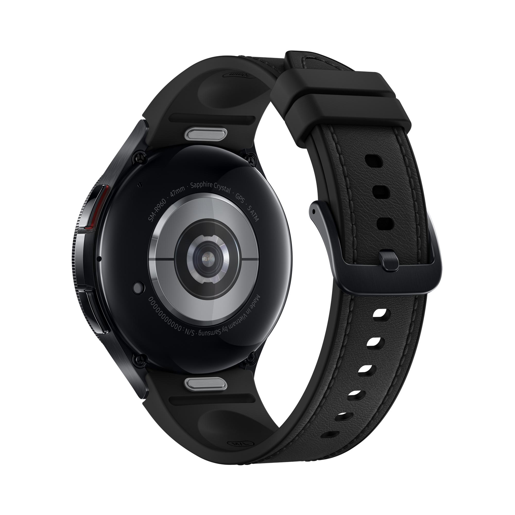 Eine schwarze Smartwatch mit schwarzem Armband, zeigt die Rückseite mit Details.