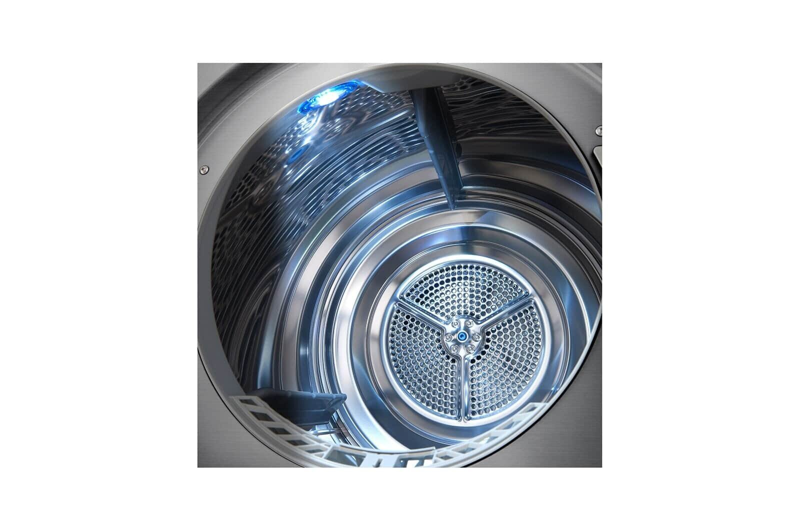 Wnętrze srebrnej suszarki. W środku znajduje się niebieskie światło.