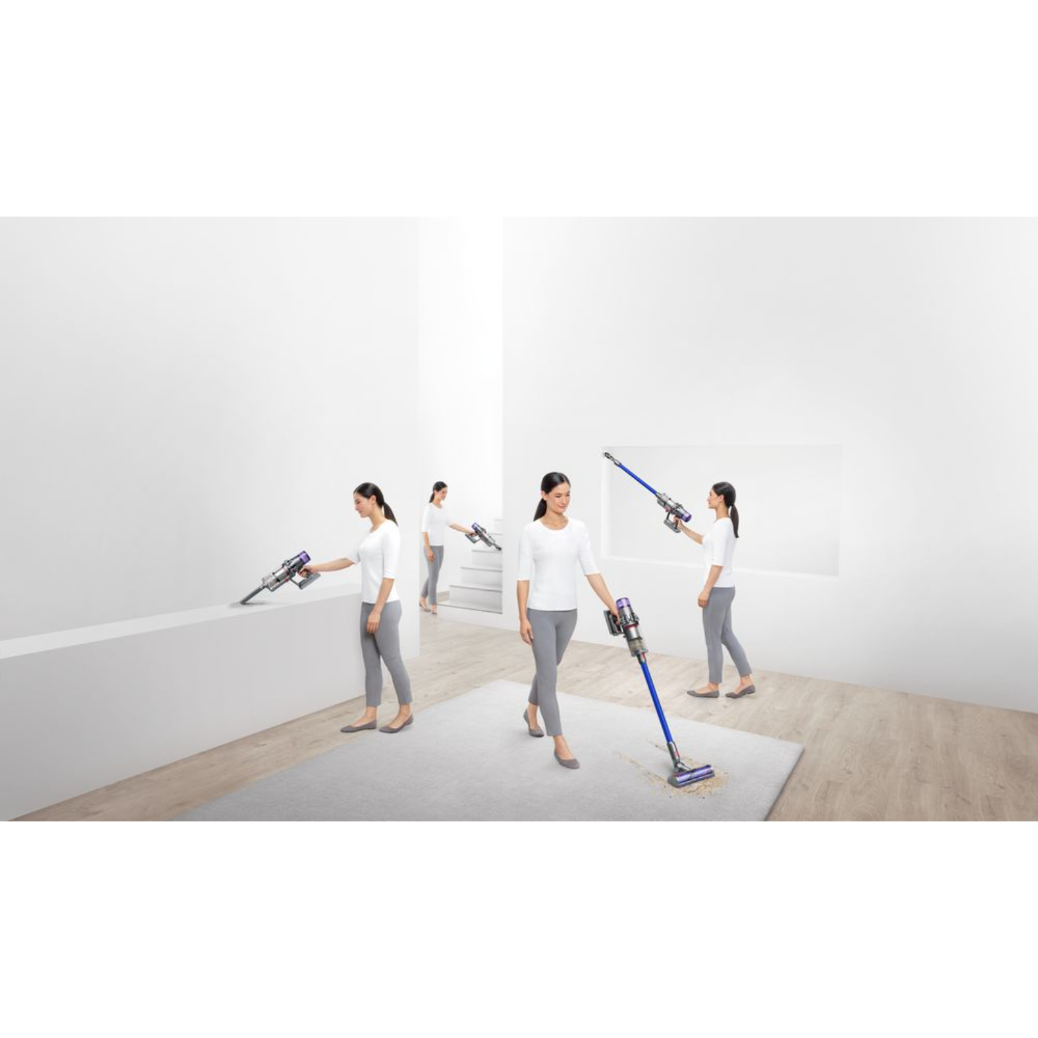 Multiple women cleaning with Dyson vacuums on a white background. One woman is vacuuming a rug.