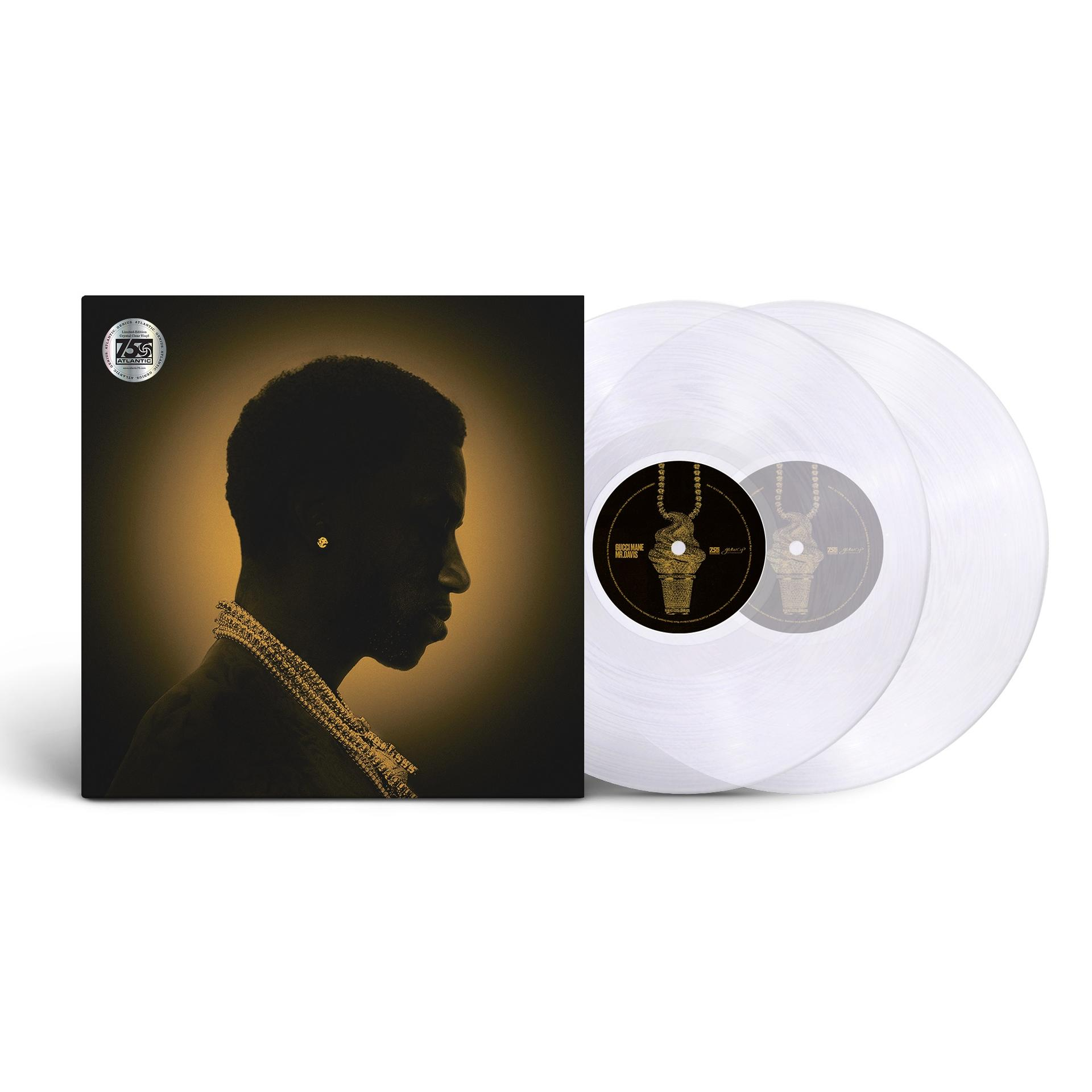 Albumcover und zwei Vinylplatten. Männerprofil in Gold, schwarzer Hintergrund.