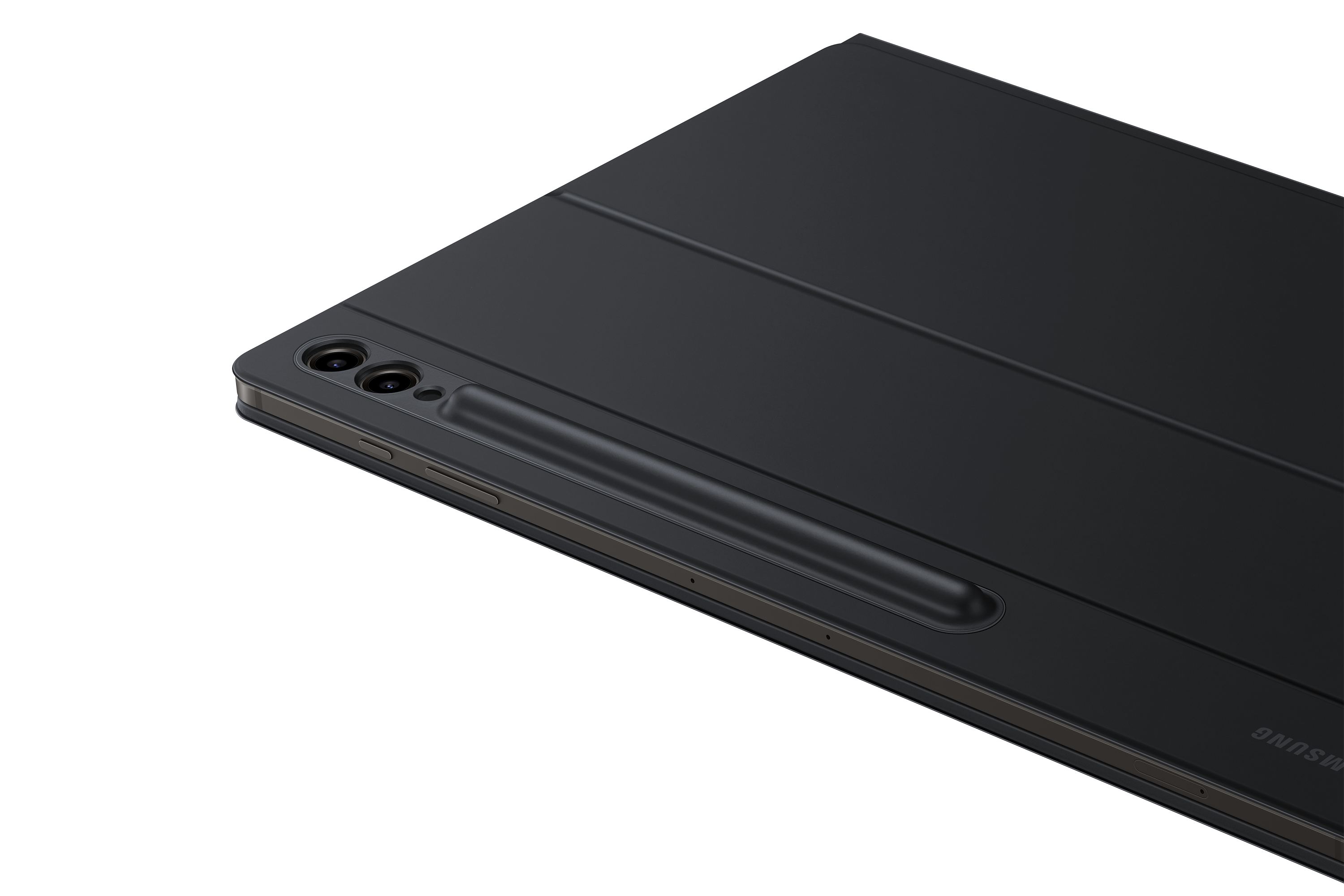 Siyah bir yüzeyde, bir kalemle siyah tablet, açılı çekim.