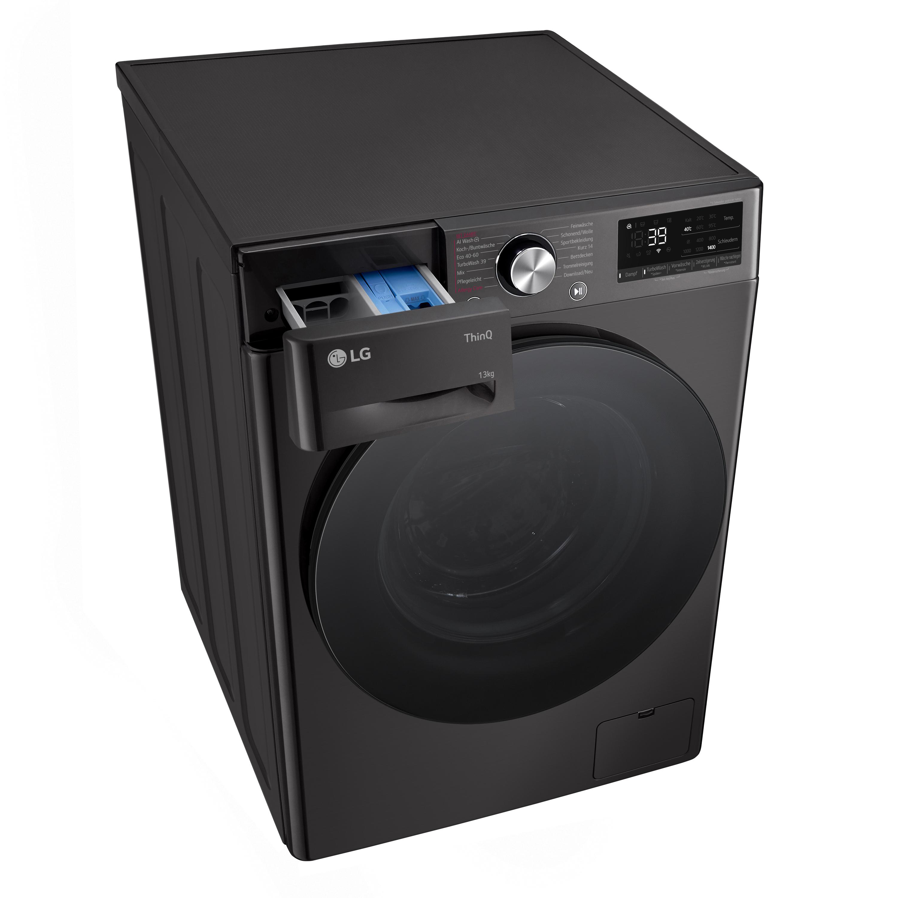 Schwarze LG Waschmaschine, Draufsicht. Waschmittelschublade offen, Bedienfeld oben, schwarze Tür.