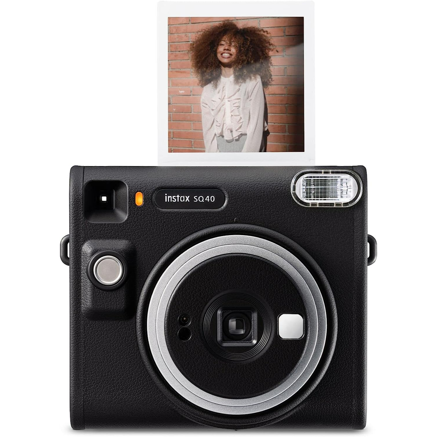 Black Instax SQ40 camera with a photo of a smiling woman with curly hair.