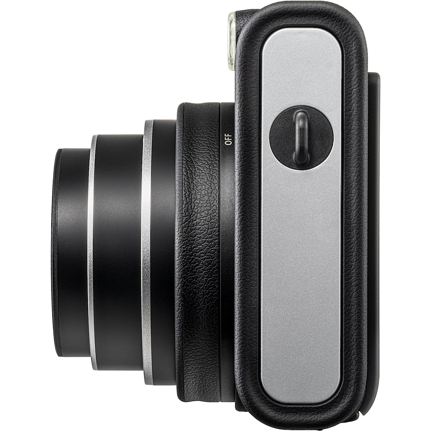 Side view of a silver and black camera. The lens is on the left, and the power button is on the right.