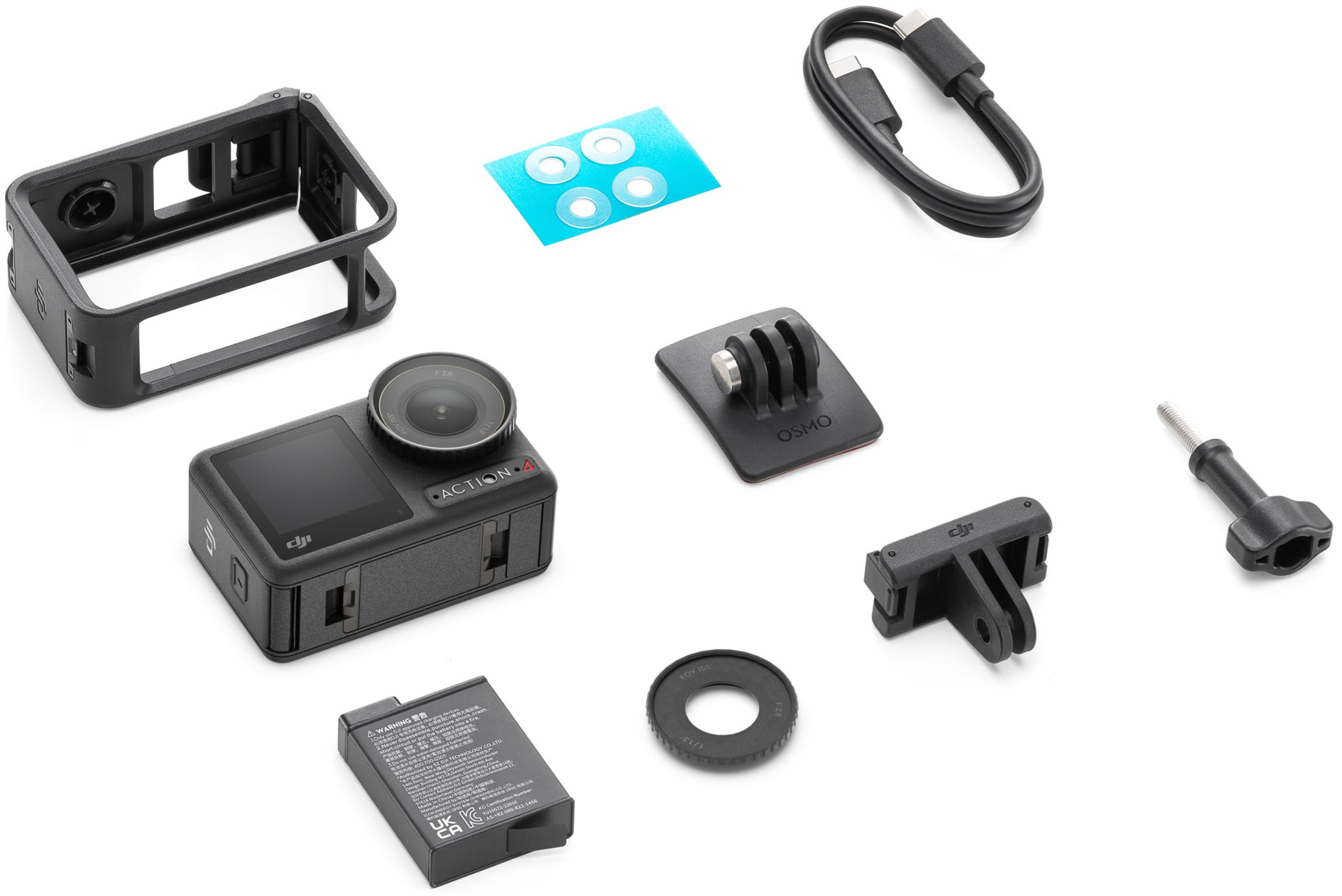 Schwarze Kamera mit Zubehör, einschließlich Käfig, Halterungen, Kabel und Akku, auf einer Oberfläche angeordnet.