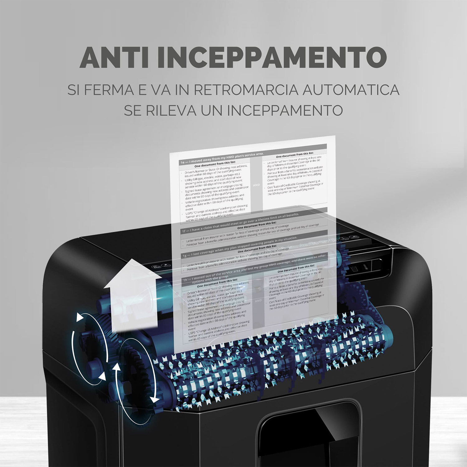 Un tritadocumenti con un documento in fase di distruzione. Ingranaggi e componenti interni sono visibili.
