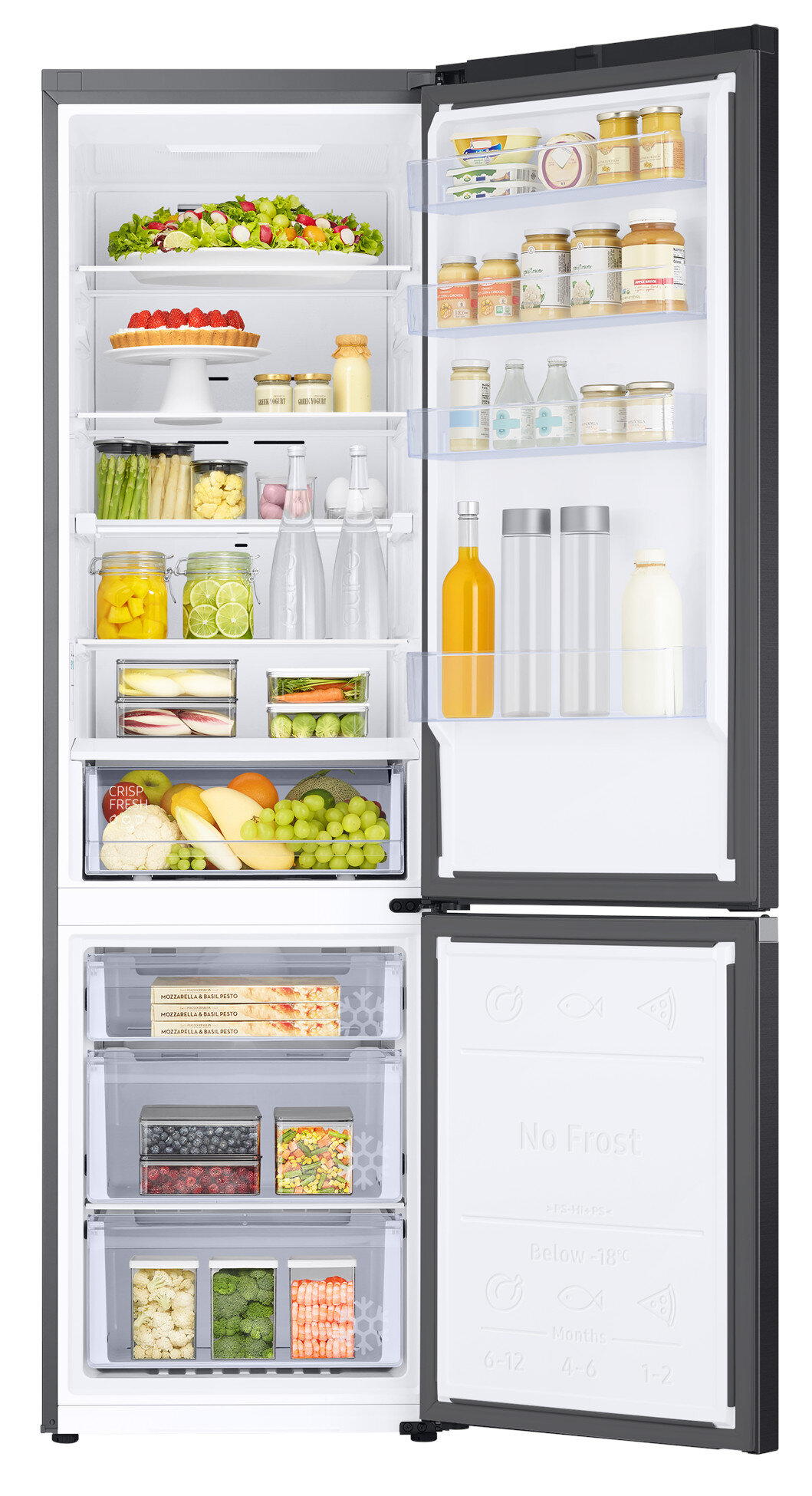 Otwarta lodówka z jedzeniem: warzywa, sosy, napoje, mrożonki.