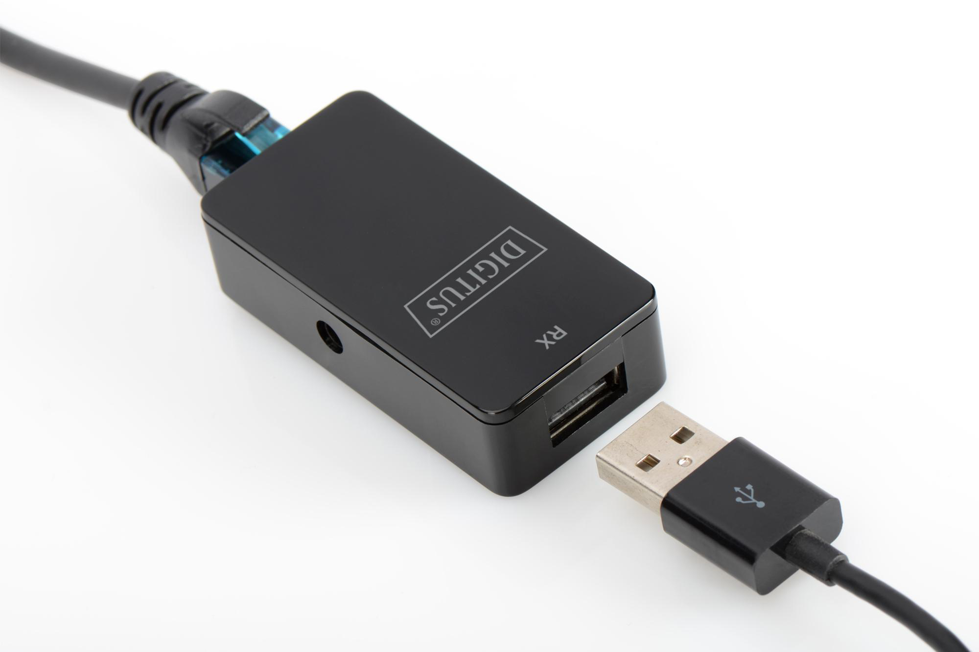 Ein schwarzer DigitUS RX Adapter mit USB- und Netzwerkkabeln auf weißem Hintergrund.