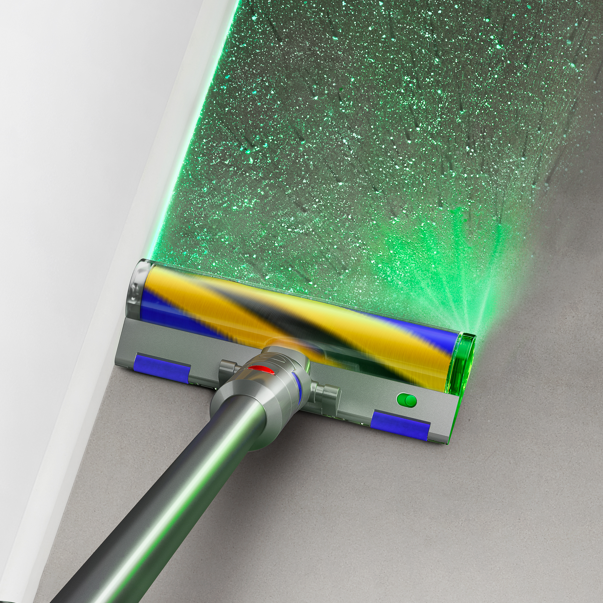 Staubsaugerkopf, der grünes Laserlicht auf eine Oberfläche emittiert, Nahaufnahme.