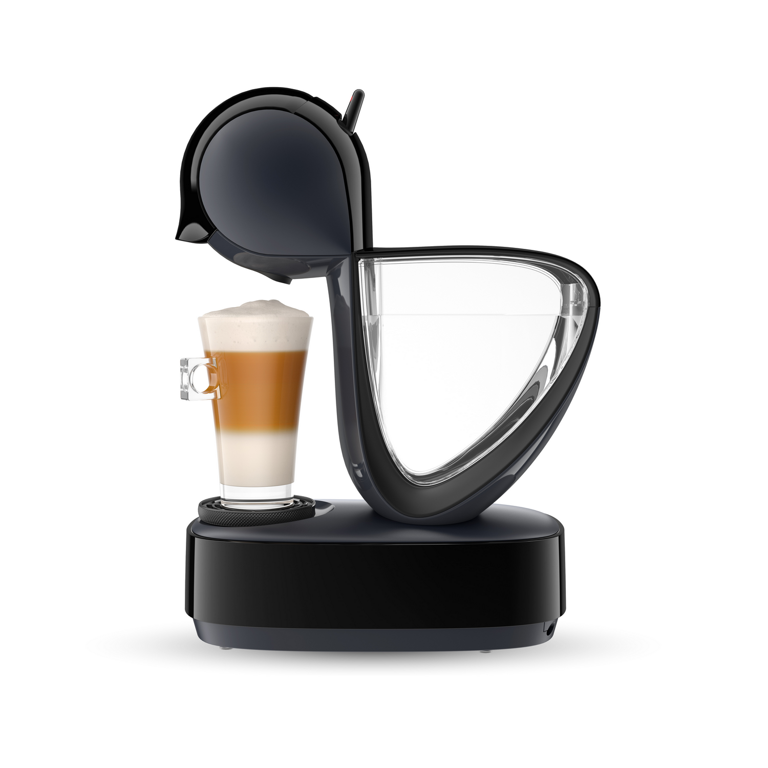 Cafetera negra con recipiente de agua transparente y un vaso con leche.