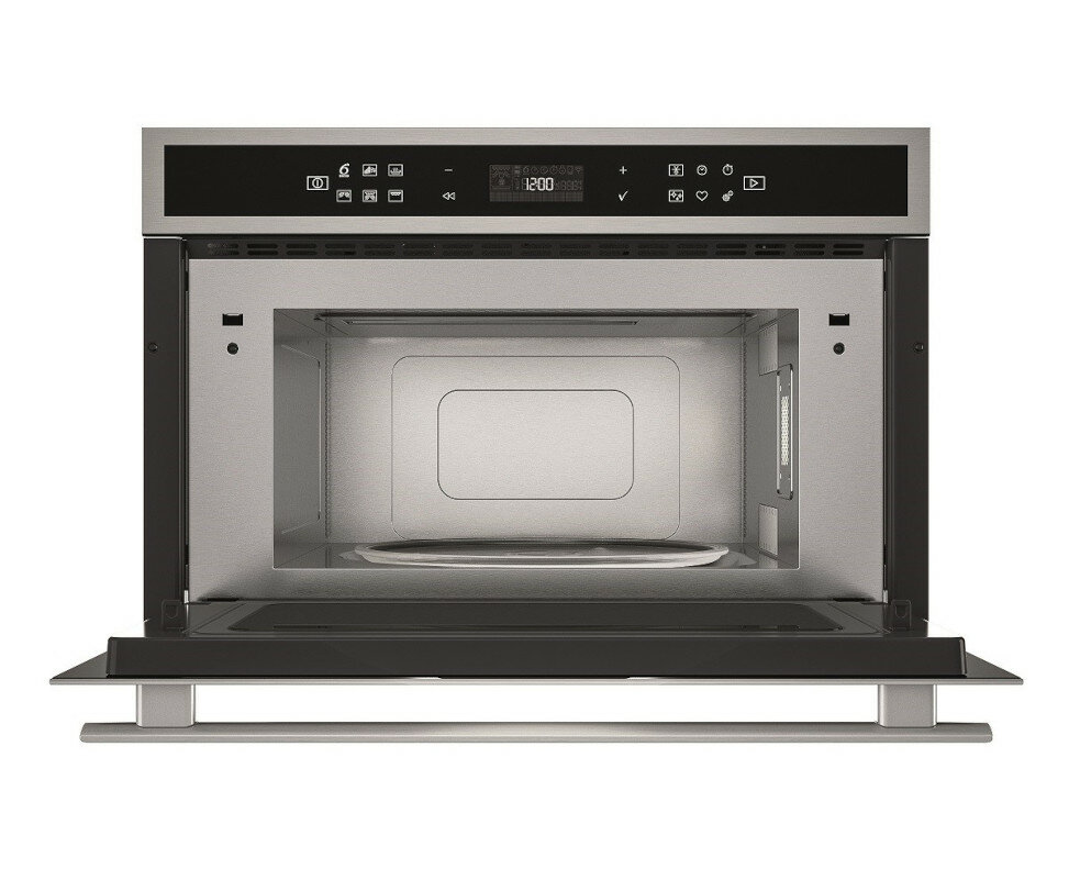 Kuchenka mikrofalowa, otwarte drzwi, widoczne wnętrze, z wyświetlaczem cyfrowym.