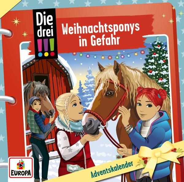 Buchcover: 'Die drei !!!' mit Ponys, Kindern und Weihnachtsmotiv. Roter Einband mit Goldakzenten.