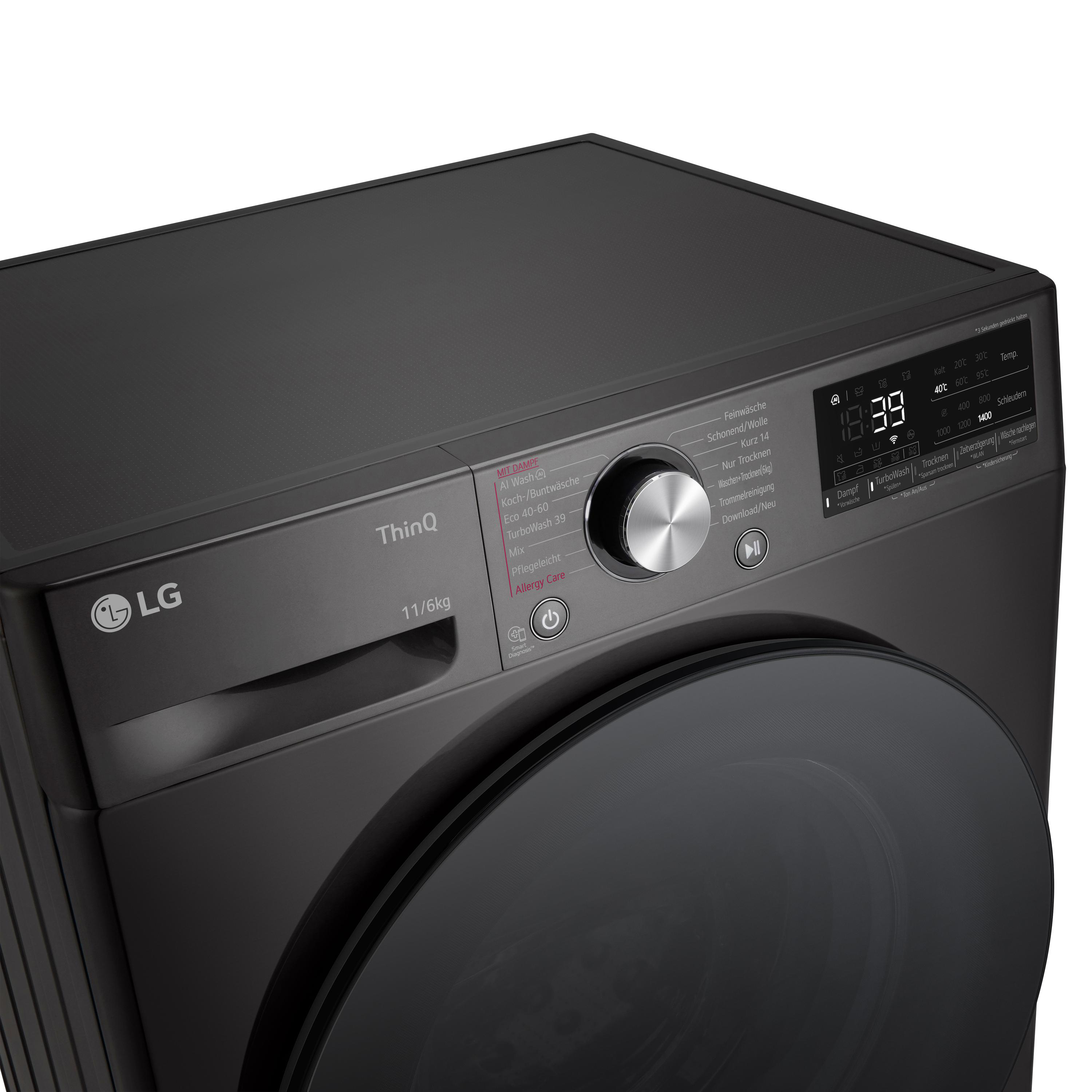 Eine schwarze LG Waschmaschine, schräge Ansicht, zeigt Bedienelemente.