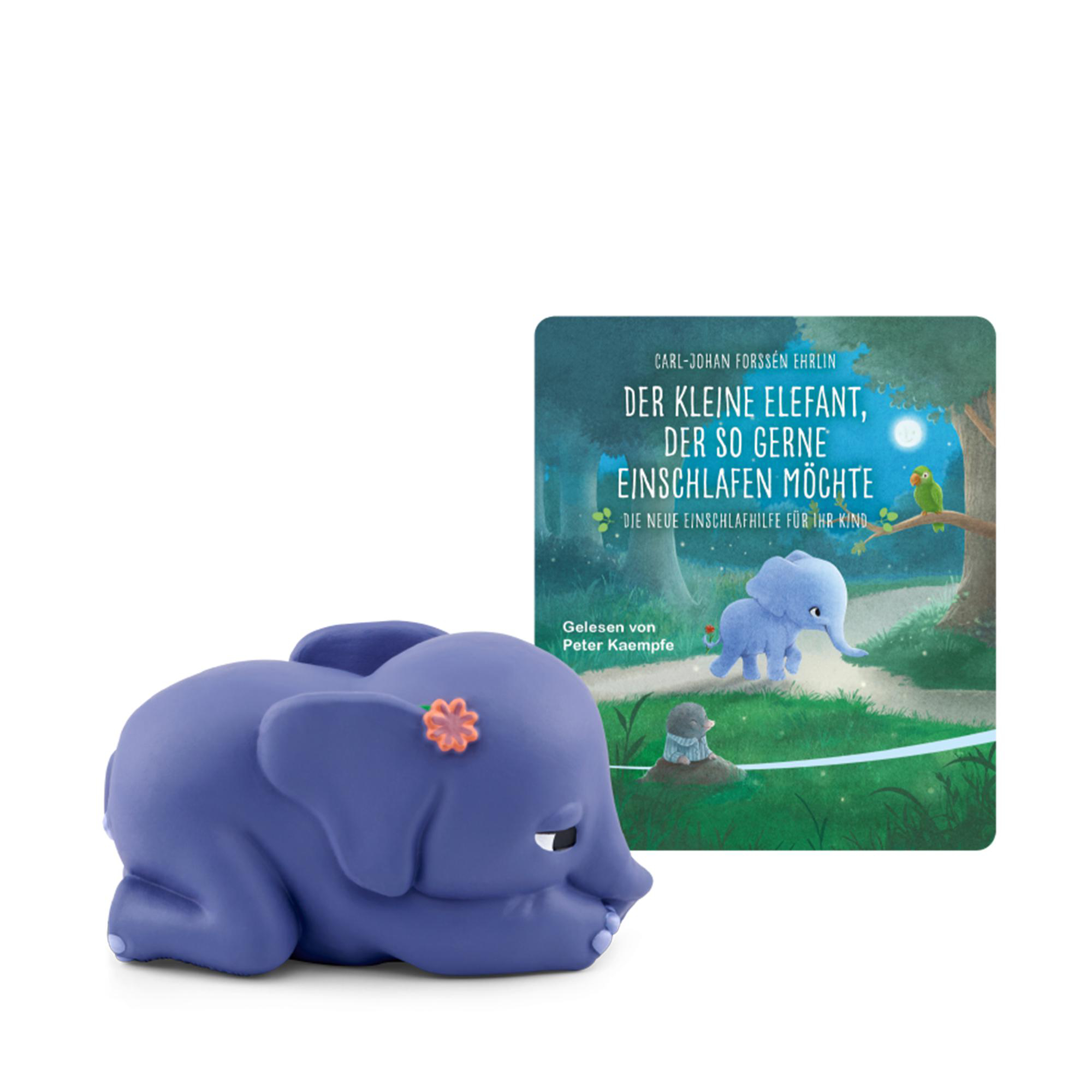 Ein lila Elefantenspielzeug neben einem Buch mit dem Titel 'DER KLEINE ELEFANT' mit einem Elefantenbild.