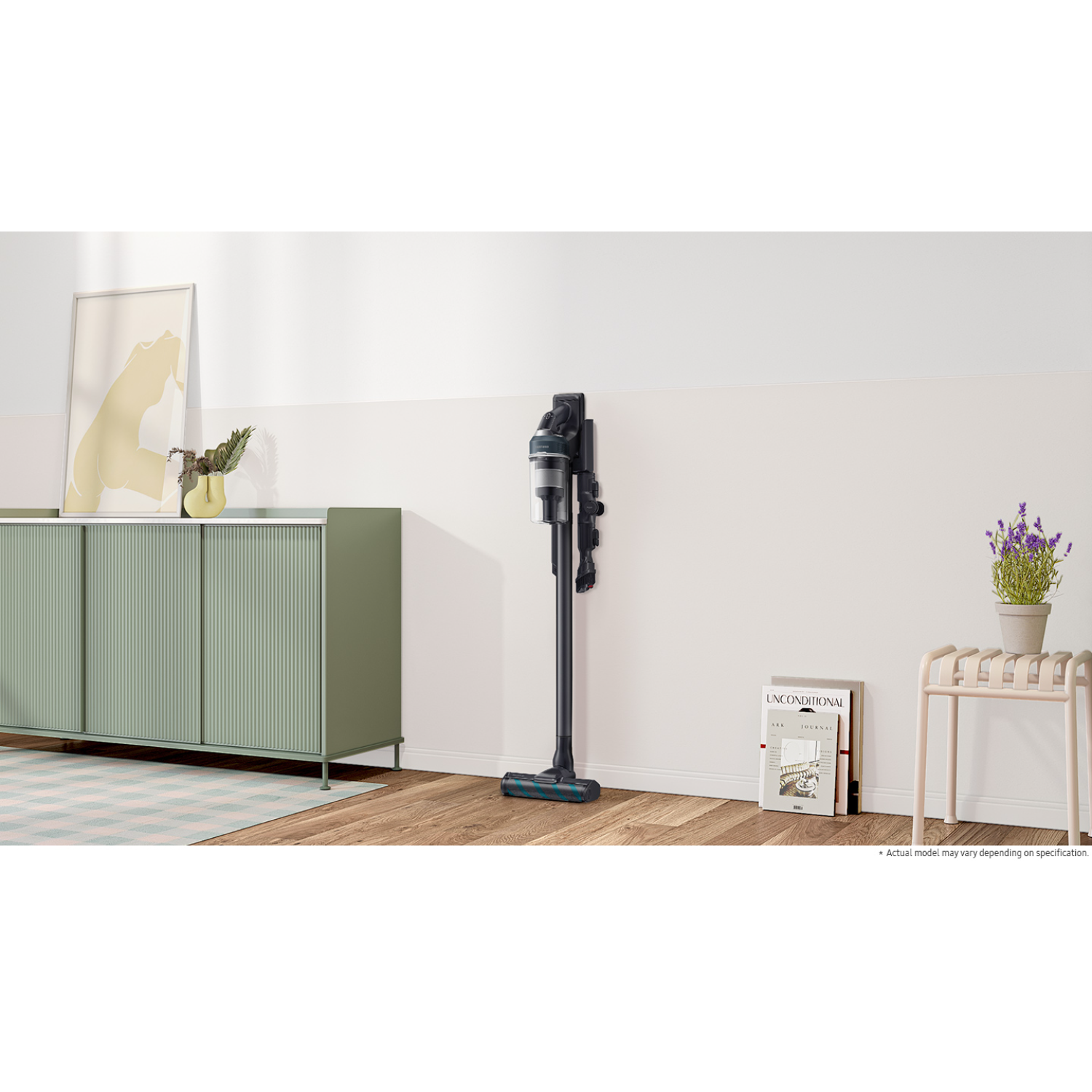 A modern vacuum cleaner standing on a floor with a white wall and decorative elements.