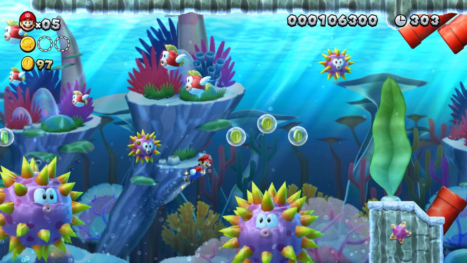 Onderwater videogame scène. Mario springt, met vijanden en munten in beeld.