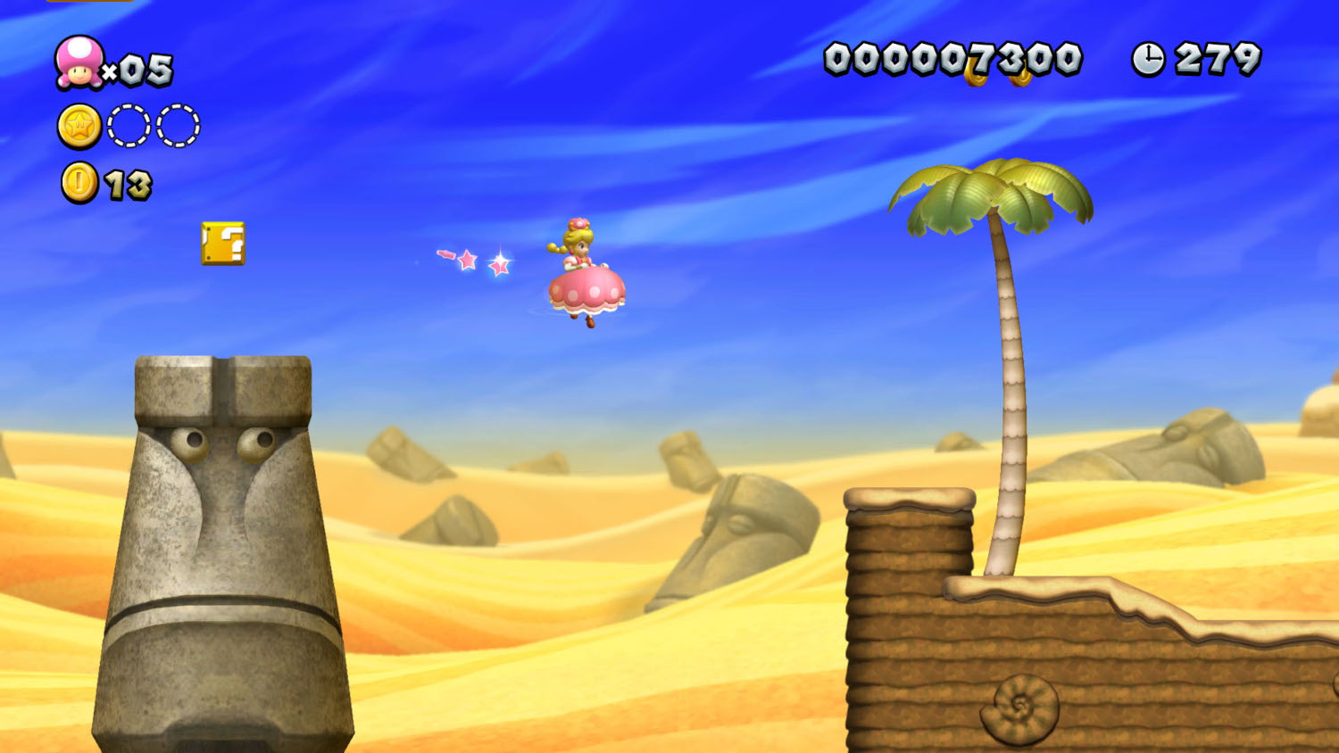 Prinses Peach in een woestijnscène, springt met sterren.