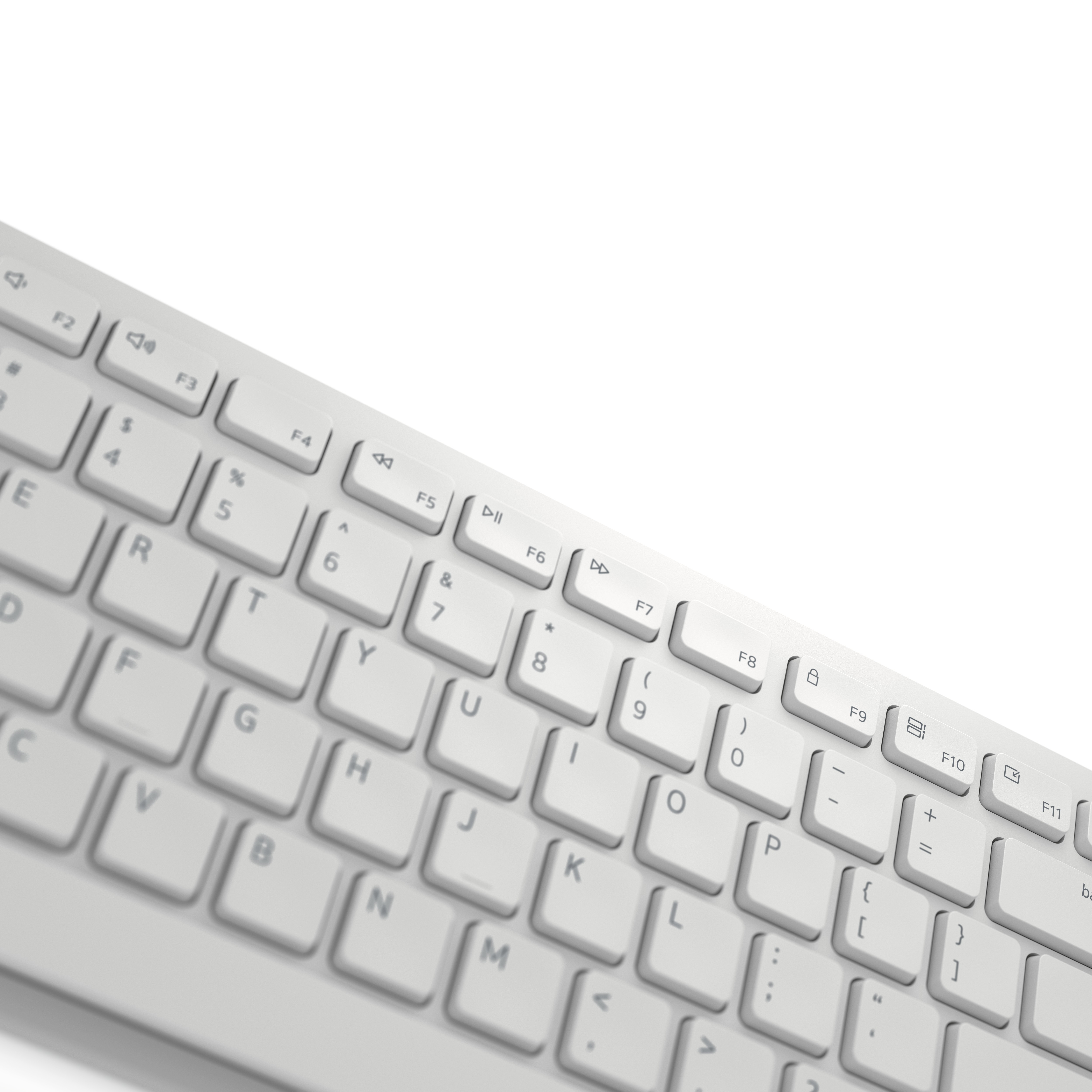 Nahaufnahme einer hellfarbigen Computertastatur mit Tasten, Buchstaben und Symbolen.