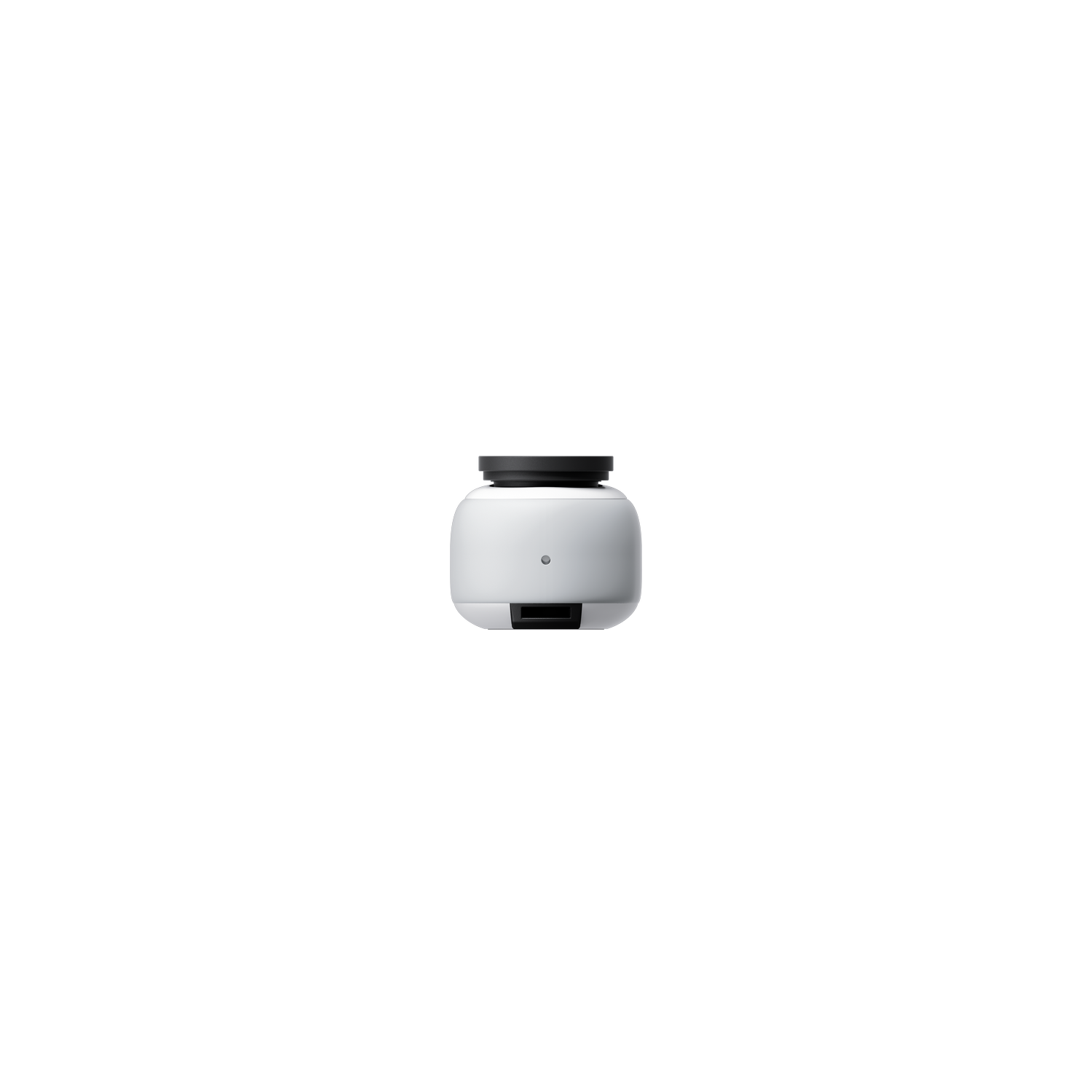 A white, rounded device with a black top, on a black background. A single button is visible.