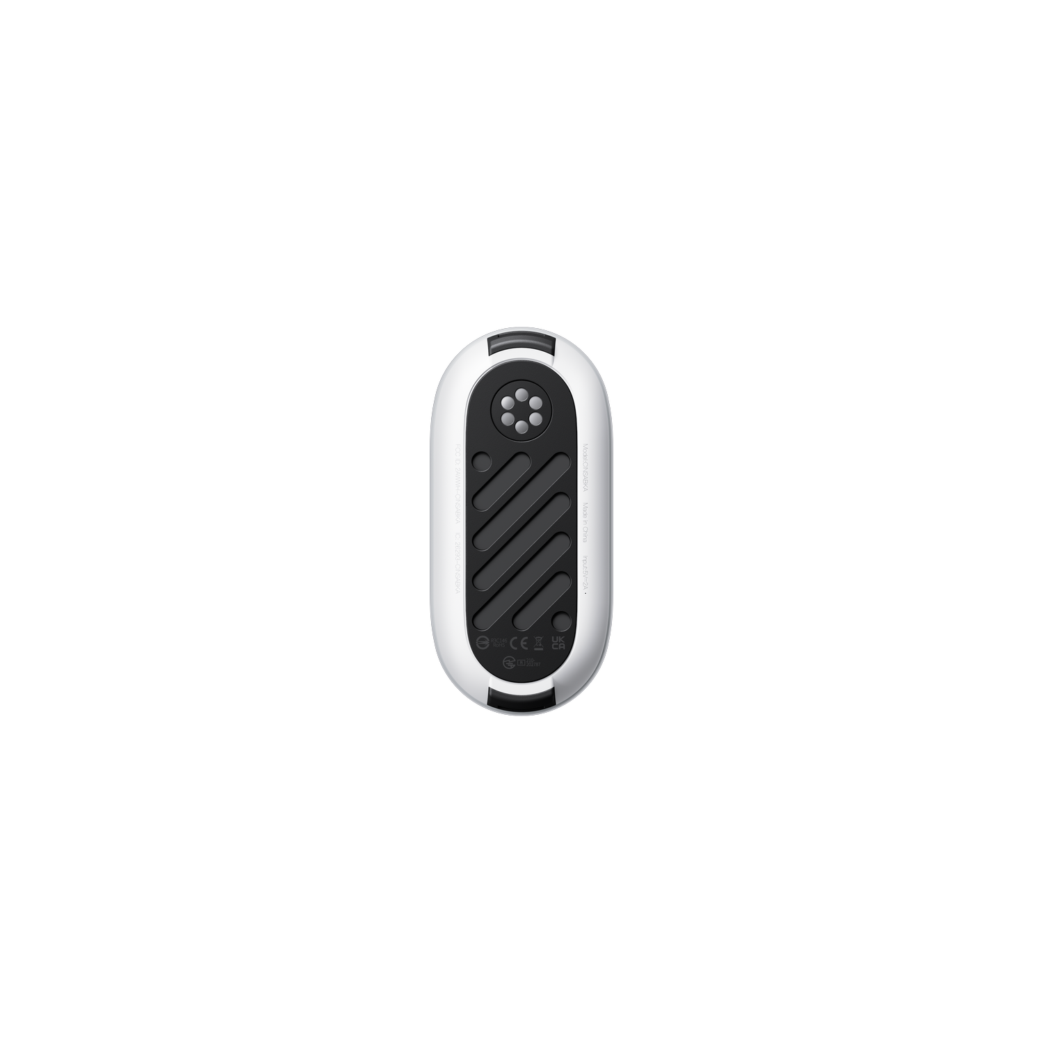 Bottom view of a white computer mouse with black details. Black background.