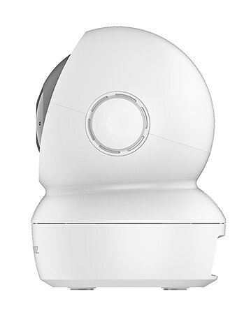 Biała kamera bezpieczeństwa z zaokrąglonym wierzchem, obiektywem i okrągłym wzorem, wyizolowana.