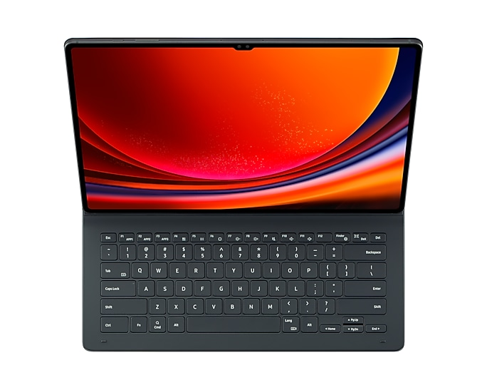 Portátil con pantalla abierta y teclado. La pantalla muestra un degradado colorido.