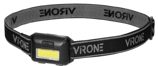 Czarna latarka czołowa z szerokim źródłem światła oraz czarno-szarym paskiem w paski z białym tekstem.