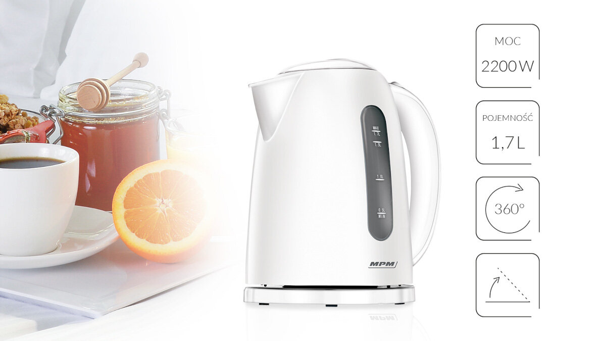 Biały czajnik elektryczny z miarkami, obok jedzenia i picia.