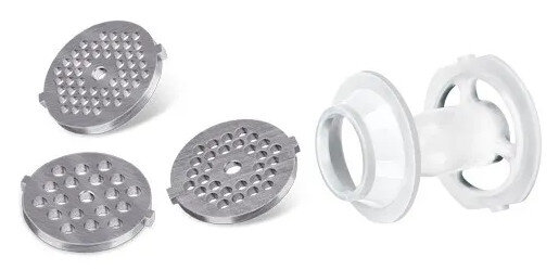 Akcesoria do maszynki do mięsa: płyty mielące i biała plastikowa część.