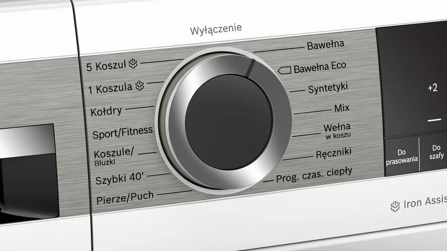 Panel sterowania pralki. Widoczne pokrętło i przyciski wyboru, z polskimi etykietami tekstowymi.