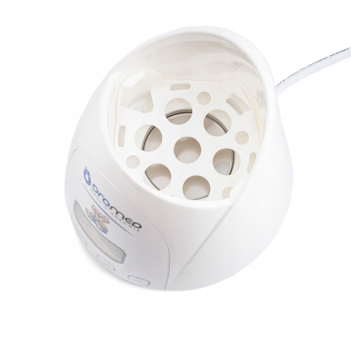 Biały sterylizator z otwartą pokrywą, pokazujący tacę wewnątrz, widok z góry.