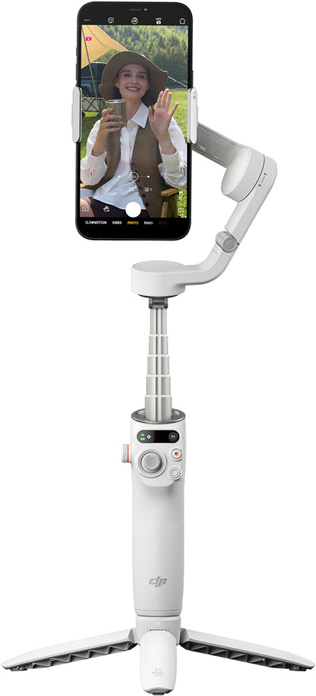 Witte selfiestick met een telefoon waarop een zwaaiende vrouw te zien is. De stick heeft een statiefvoet.