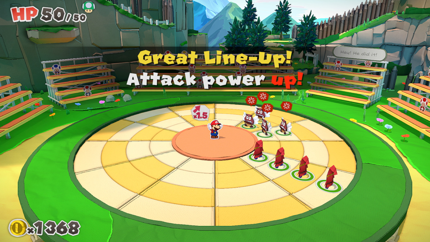 Mario sur scène dans un jeu vidéo avec texte superposé : 'Great Line-Up! Attack power up!'