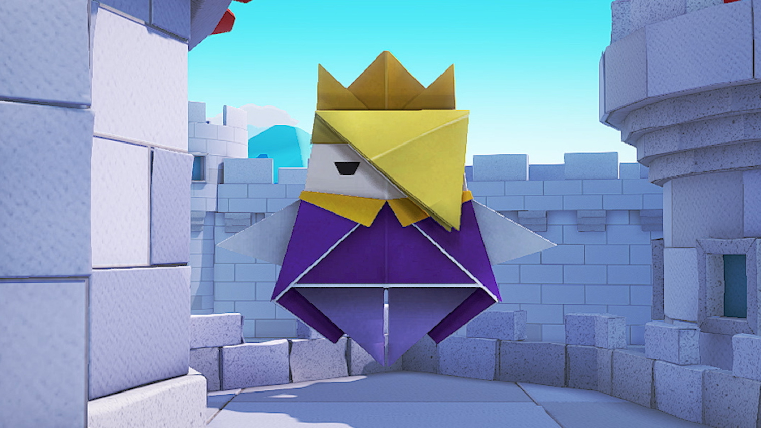 Une figurine de roi en papier dans un château, avec une couronne et des vêtements violets.