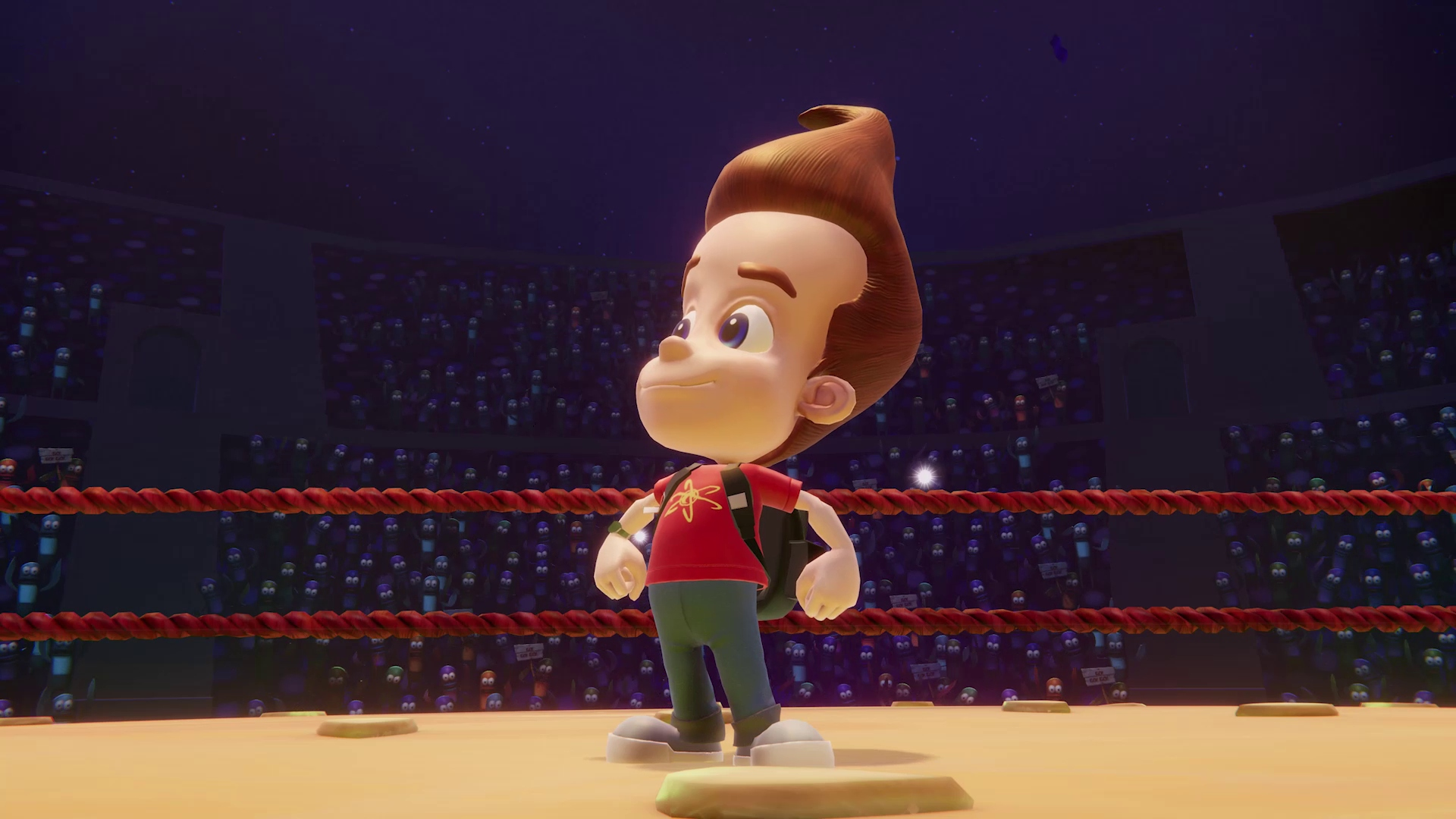 Jimmy Neutron steht in einem Wrestling-Ring. Das Publikum ist im Hintergrund.