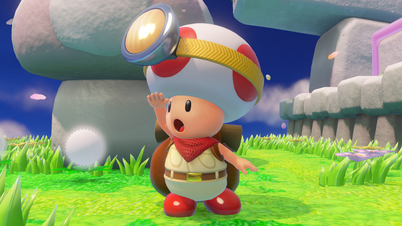 Toad-personage uit een videogame, met een rugzak en een ontdekkingsreizigershoed, in een veld.