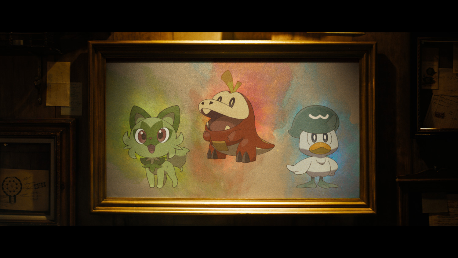 Ingelijst kunstwerk van drie Pokémon-personages.