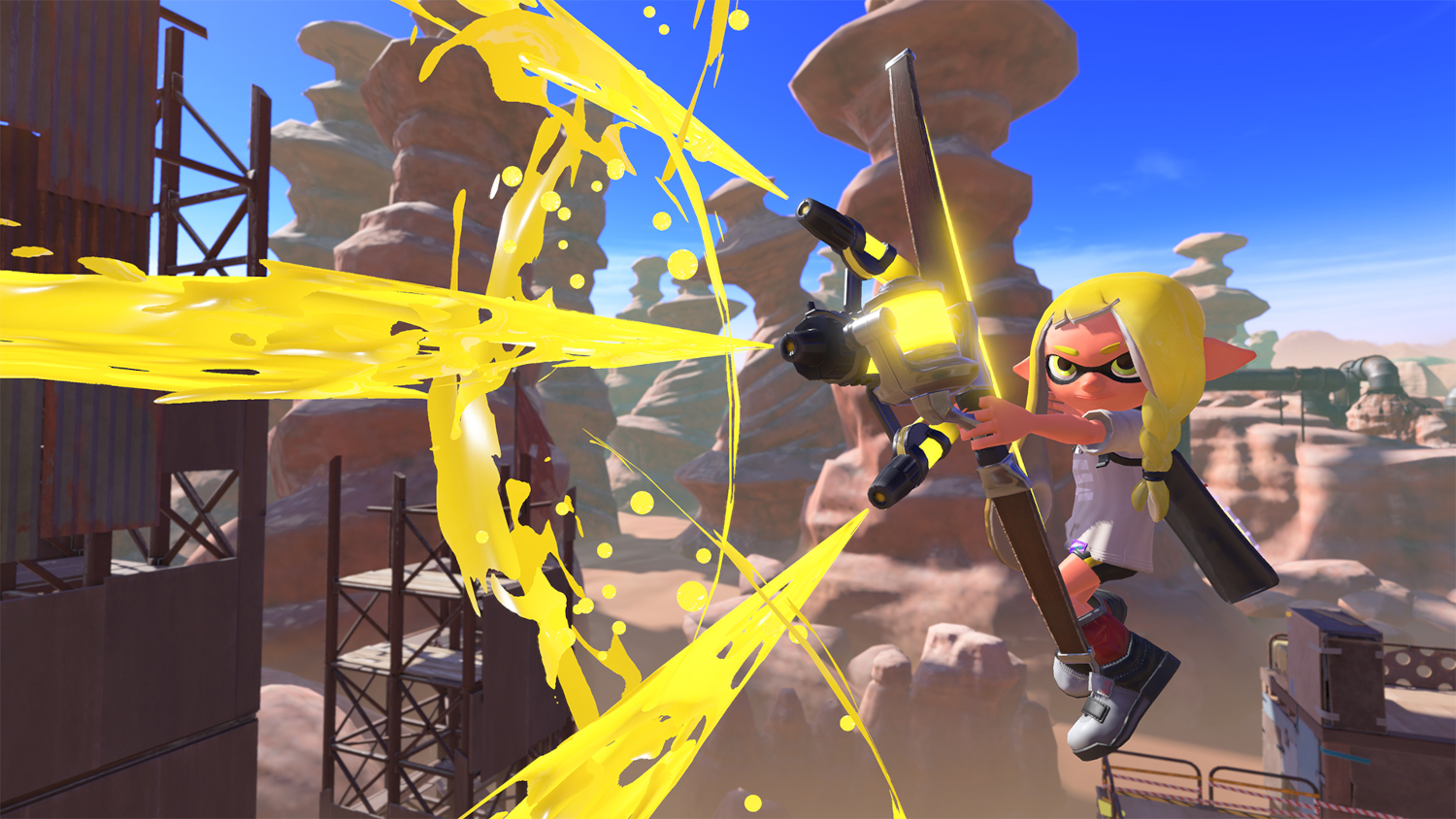 Een personage uit Splatoon 3 schiet gele inkt met een boog in een woestijn.