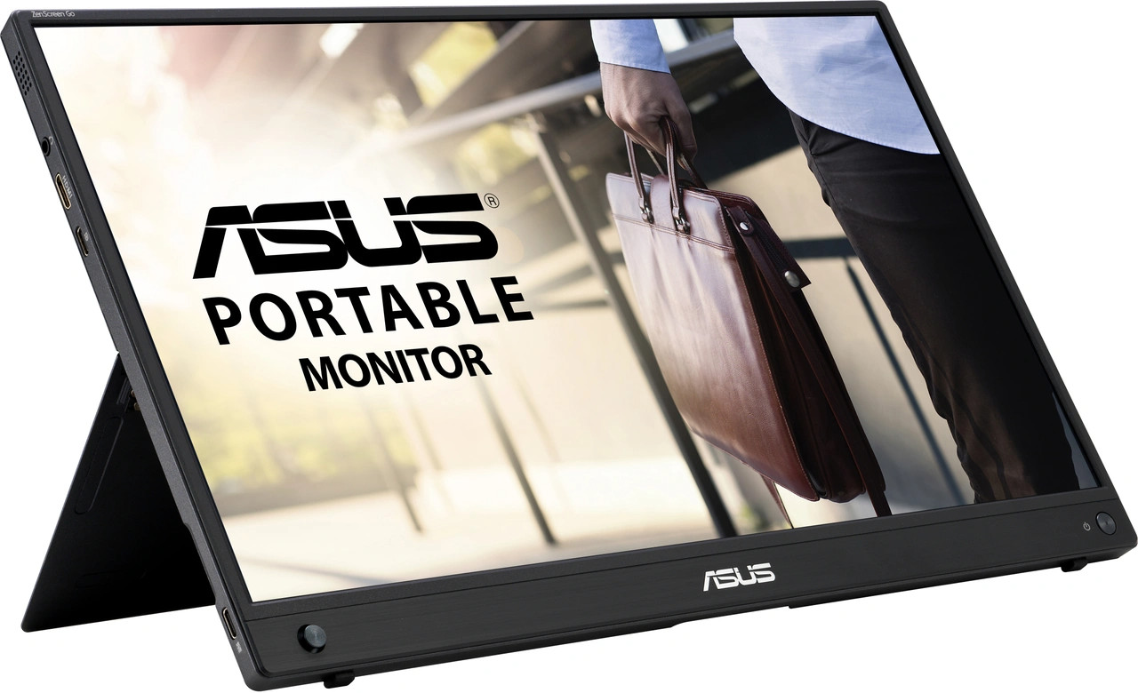 Un moniteur noir avec le logo ASUS. Une personne tenant un sac est en arrière-plan.