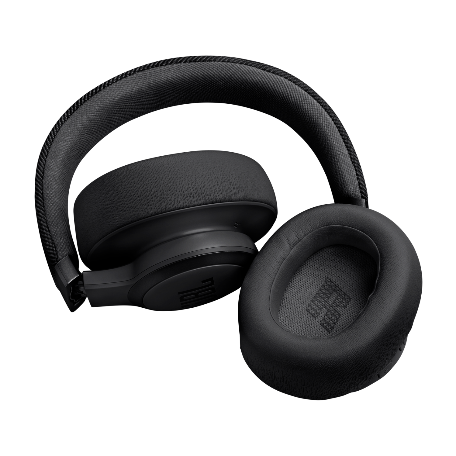 Zwarte JBL-hoofdtelefoon op een zwarte achtergrond. De oorschelpen zijn zichtbaar en naar de kijker gericht.