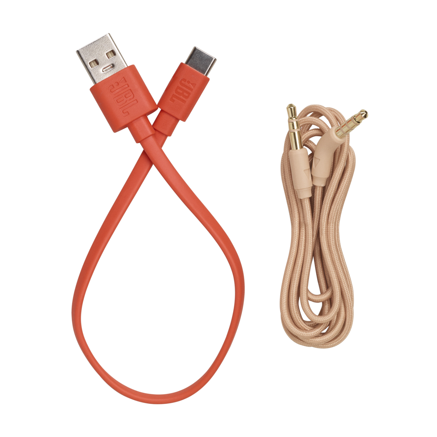 Two orange USB cables and a beige audio cable with gold connectors on a black background.